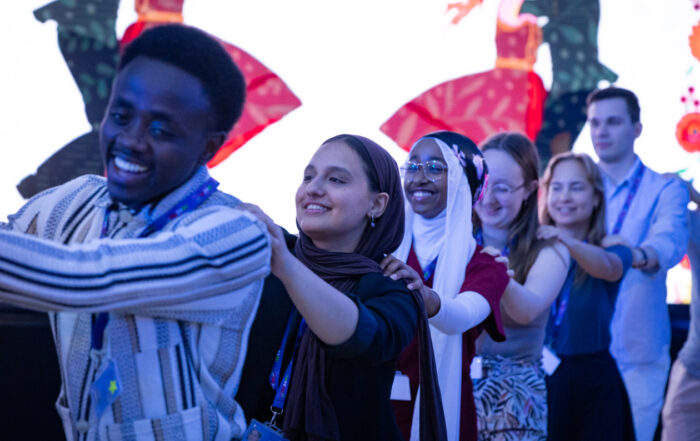 young people walking after each other